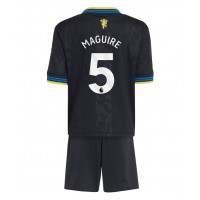 Stroje piłkarskie Manchester United Harry Maguire #5 Koszulka Trzeciej dla dzieci 2025-26 Krótki Rękaw (+ szorty)